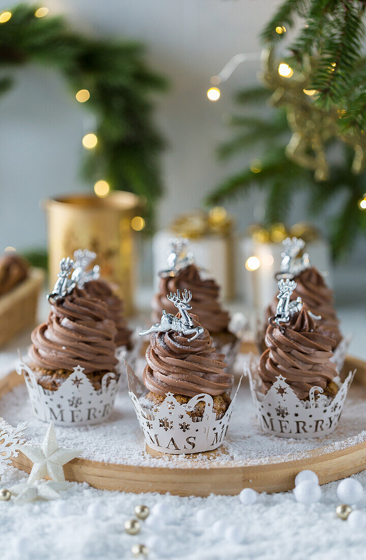 Christmas cupcakes with chocolate cream topping