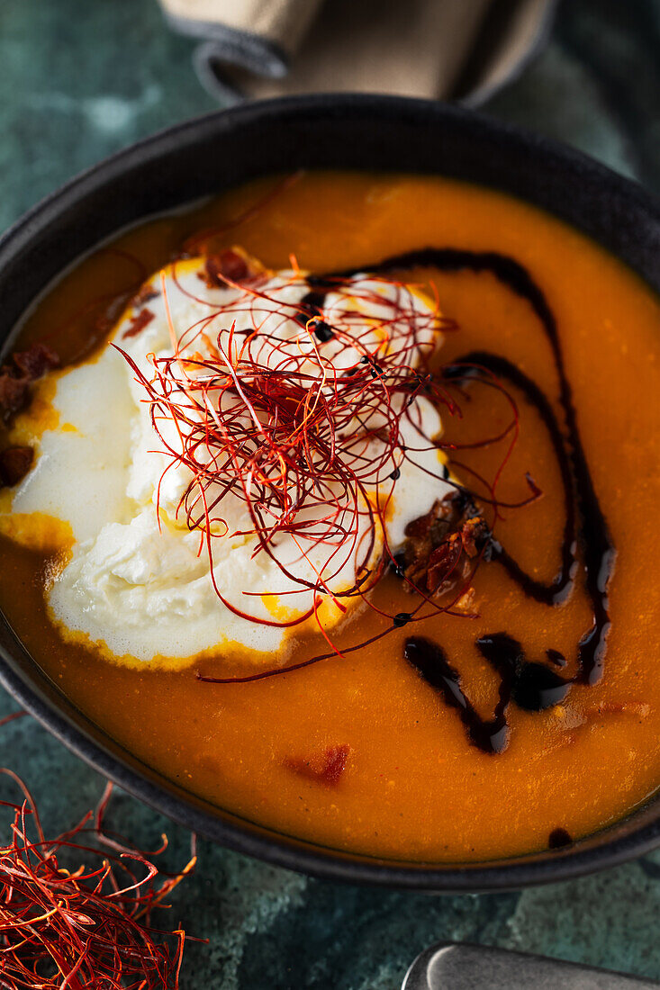 Pumpkin soup with cream and pumpkin seed oil