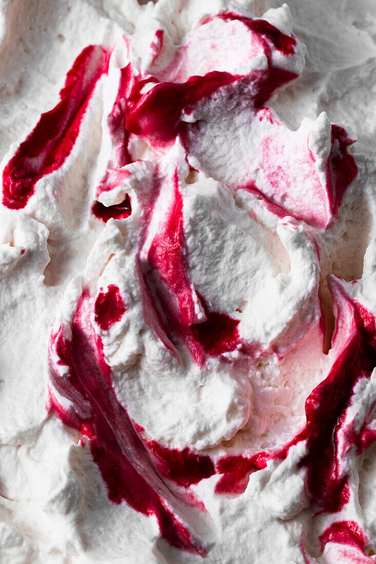 Whipped cream with berry syrup
