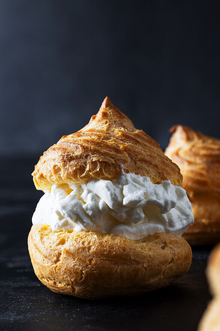 Profiteroles filled with whipped cream