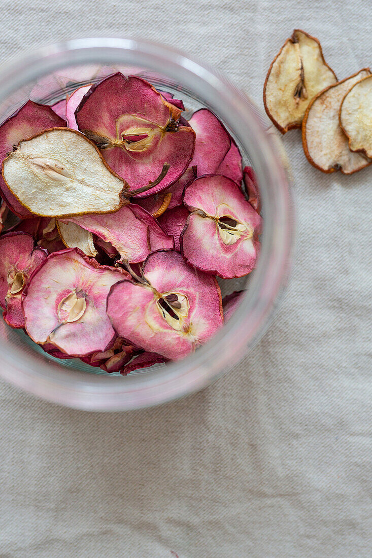 Dried red apple crisps and pear crisps