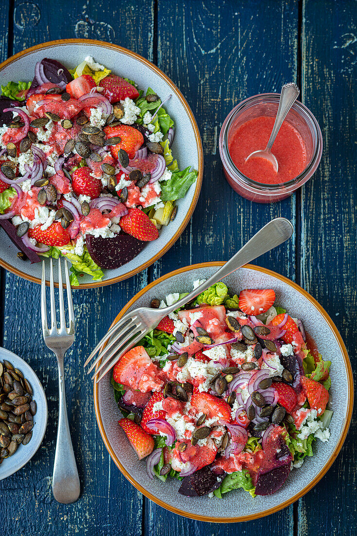 Mixed salad with beetroot, strawberries and feta