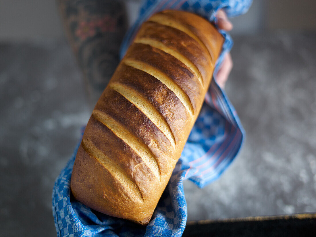 Freshly baked loaf of white bread