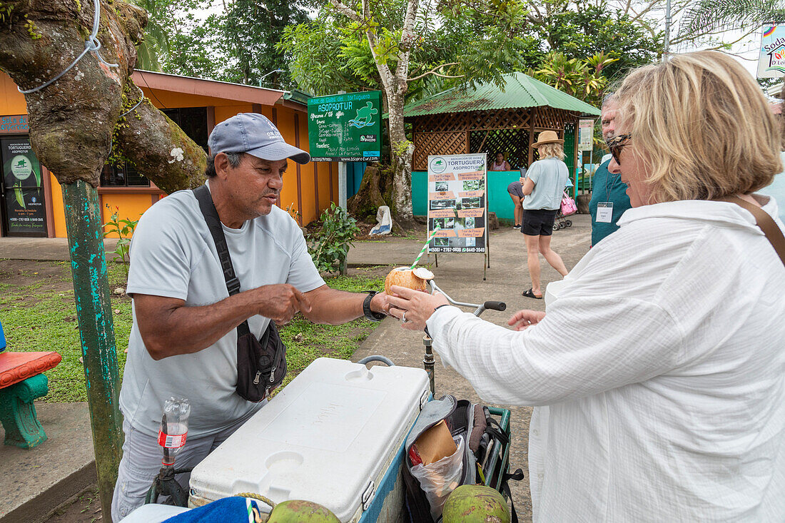 Street vendor selling coconut drink