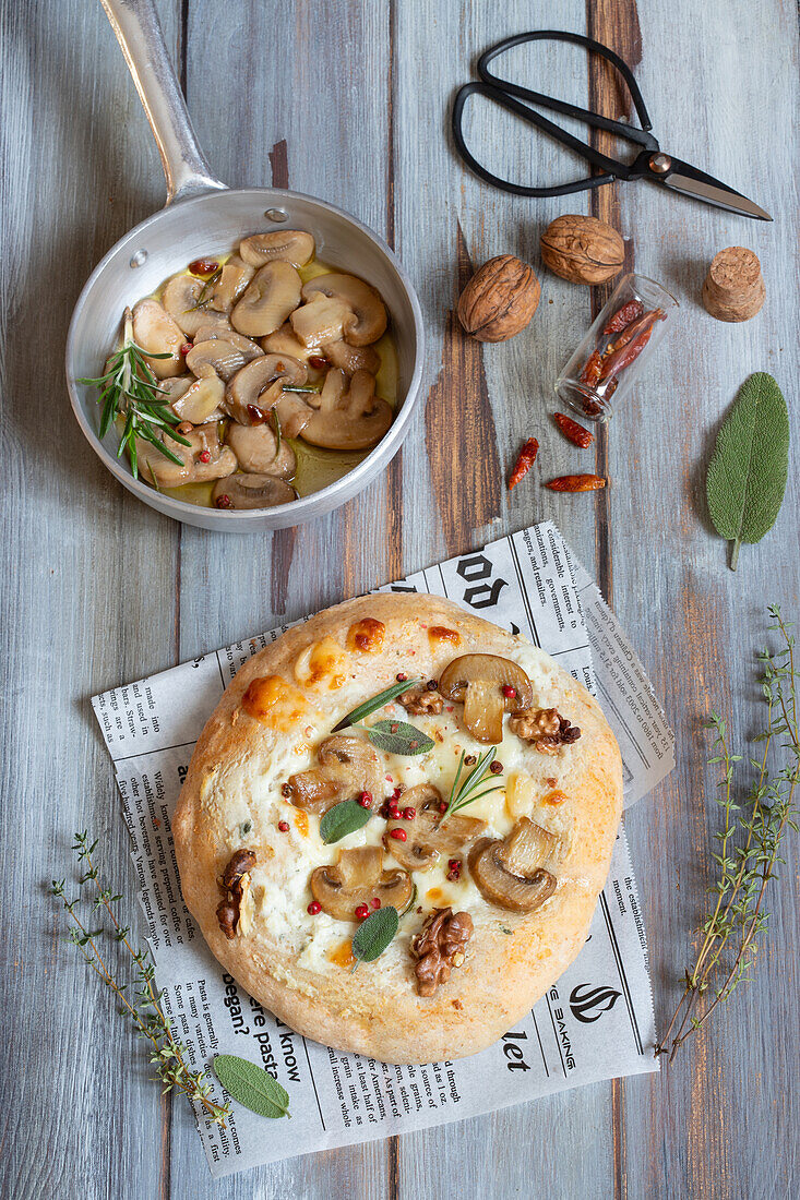 Pizza with mushrooms, ricotta, caciotta and toma