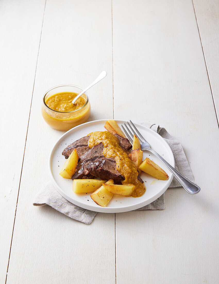 Veal cheek with roast potatoes and vegetable sauce