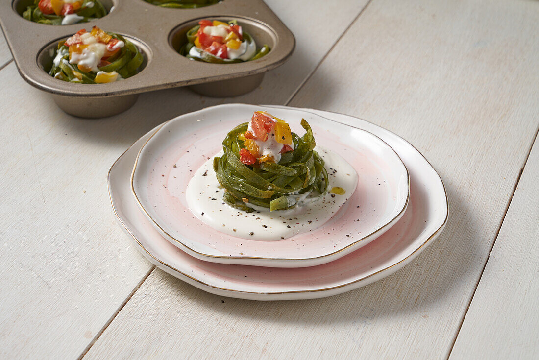 Green tagliatelle nests with vegetable ragout