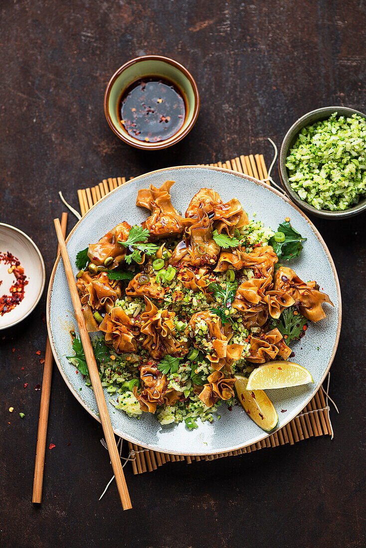 Chinese dumplings with broccoli rice