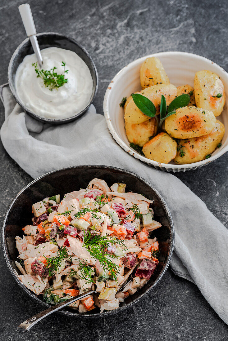 Smoked trout salad, roast potatoes and quark cream