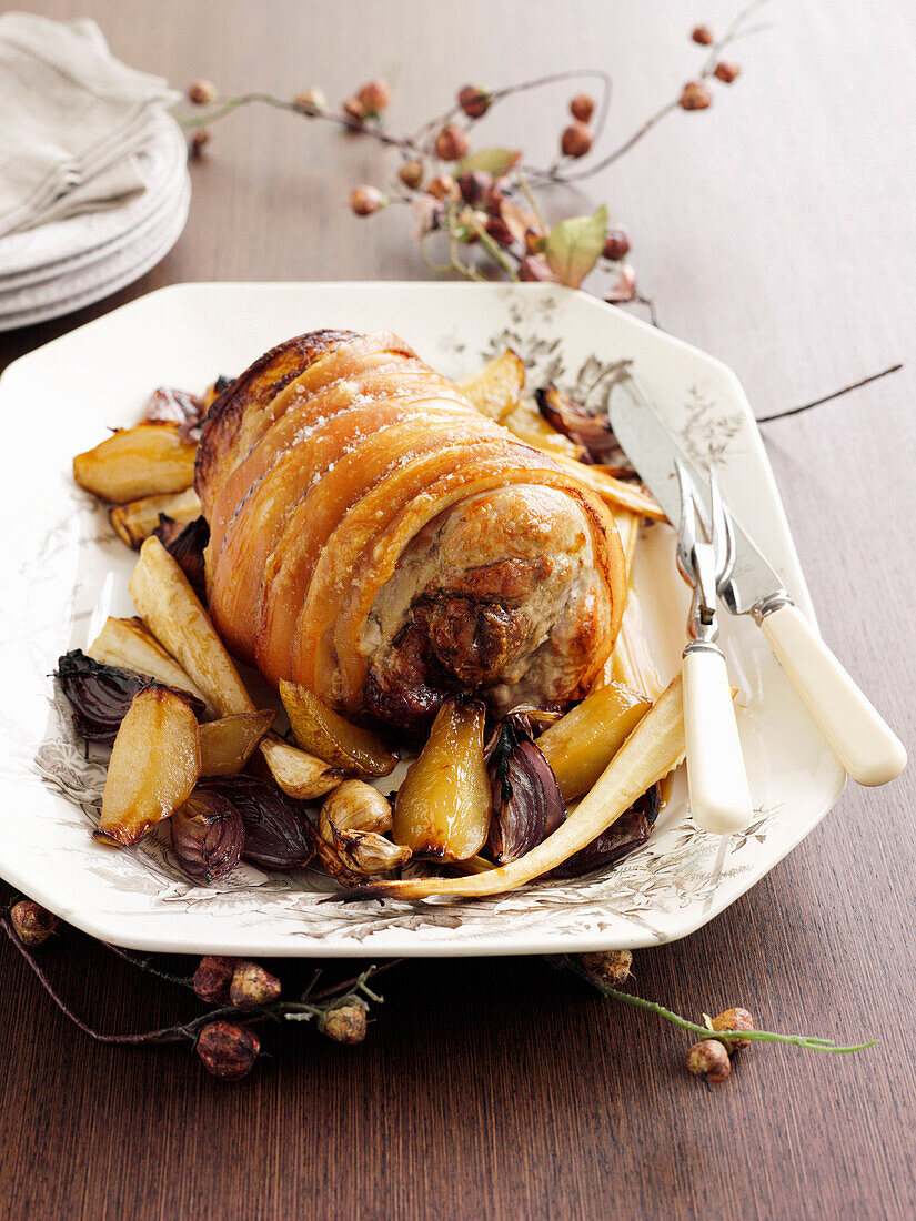 Roast leg of pork with pears and parsnips