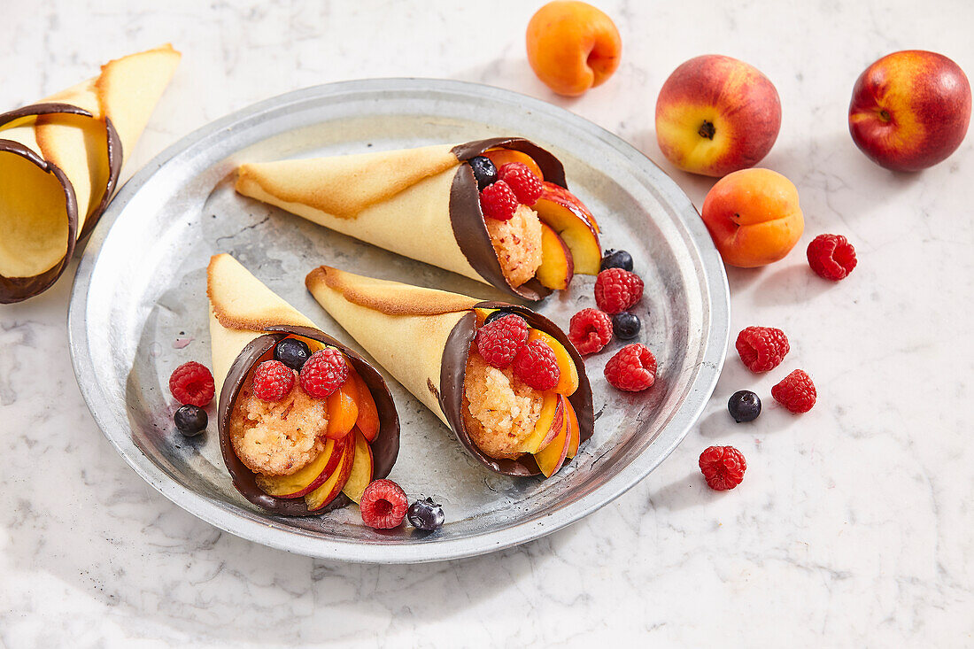 Nectarine sorbet with fruit in pastry croissants