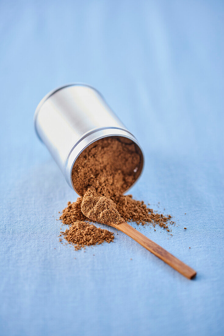 Garam Massala powder in an overturned spice tin