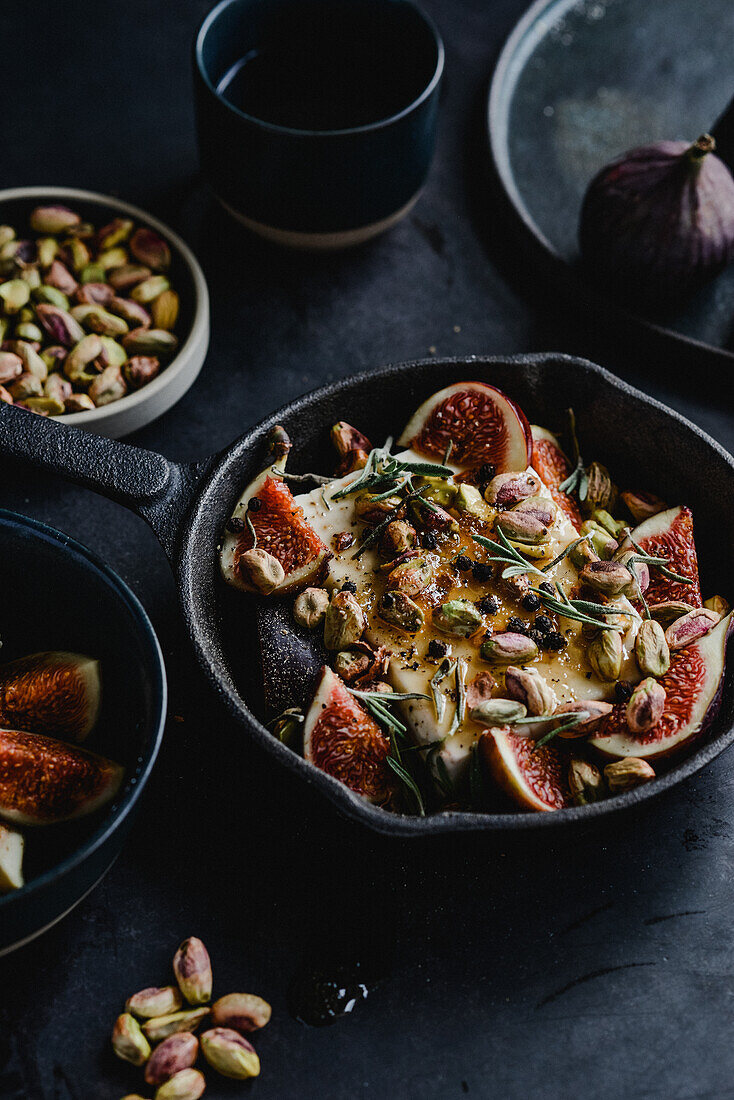 Baked feta with figs, rosemary, pistachios and honey