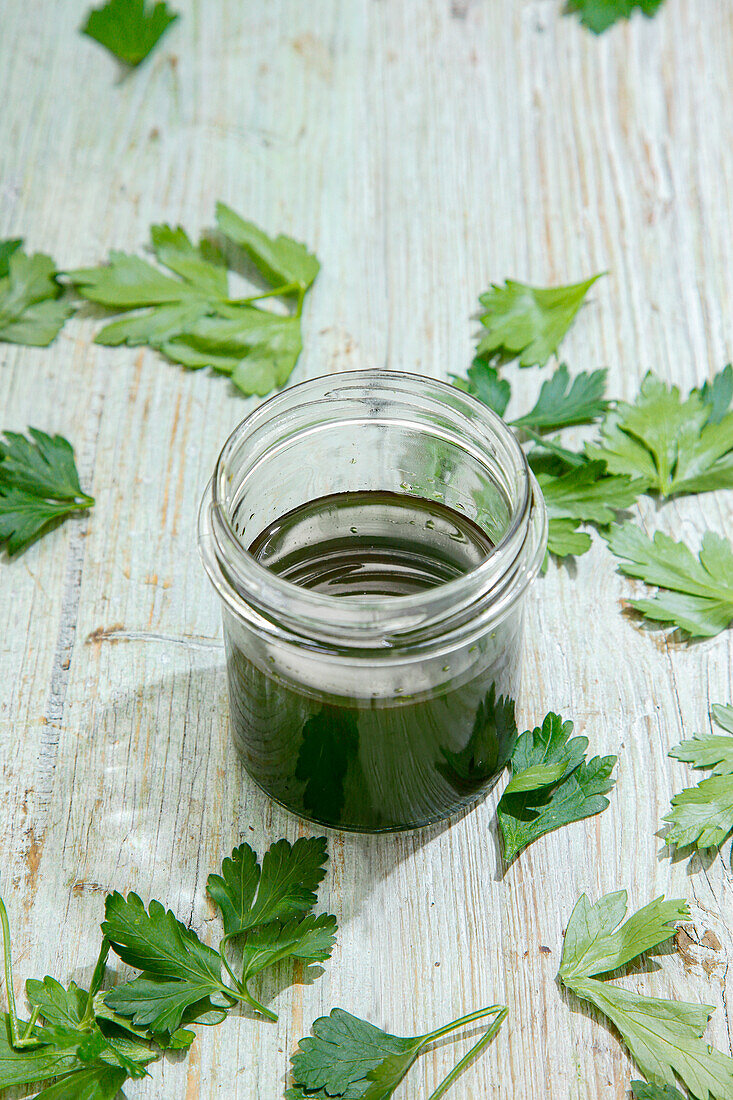 Parsley oil in a screw-top jar