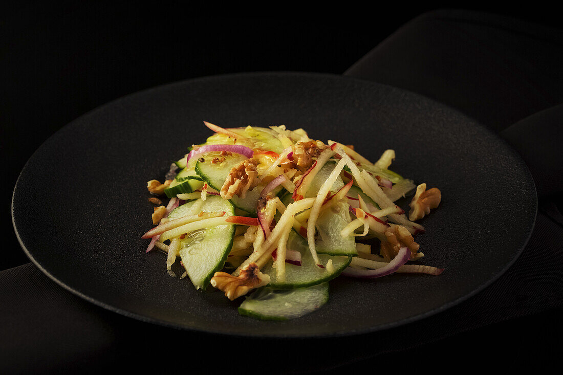 Apple and cucumber salad with walnuts