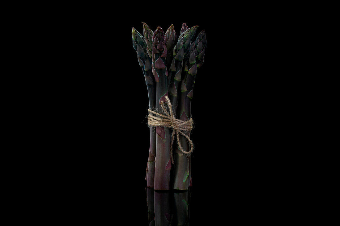 A bunch of dark purple asparagus