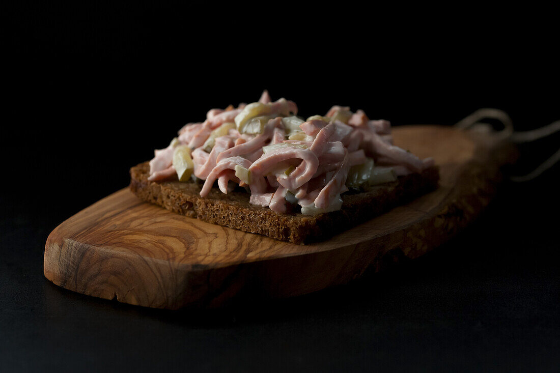 Dark rye bread with meat salad