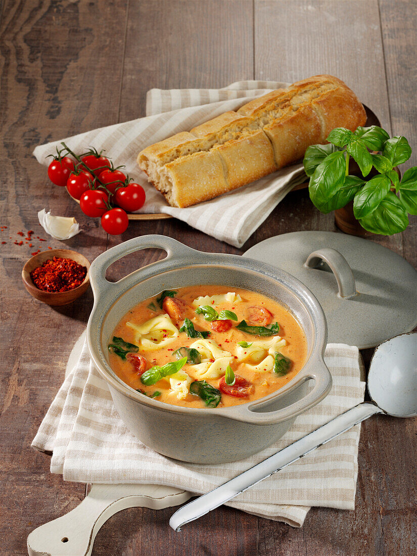 Tortellini stew with tomatoes and spinach