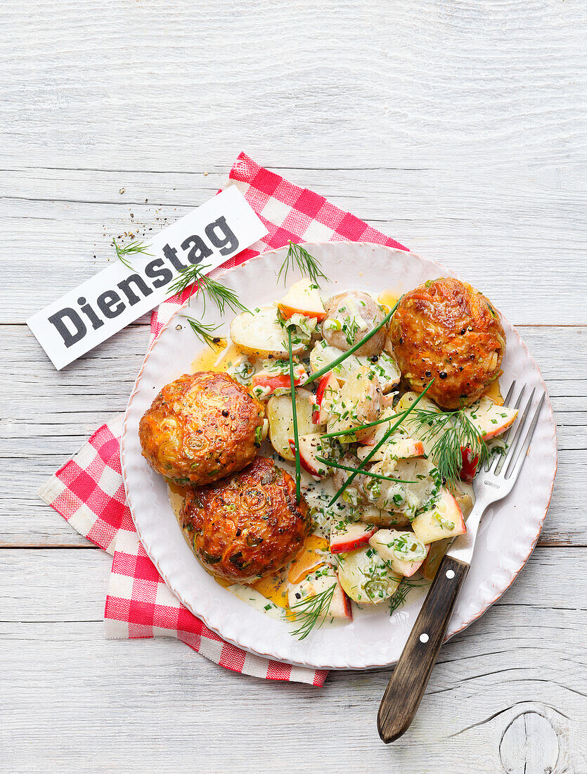 Meatballs with potato and apple salad