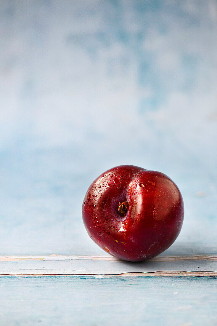 Single red plum