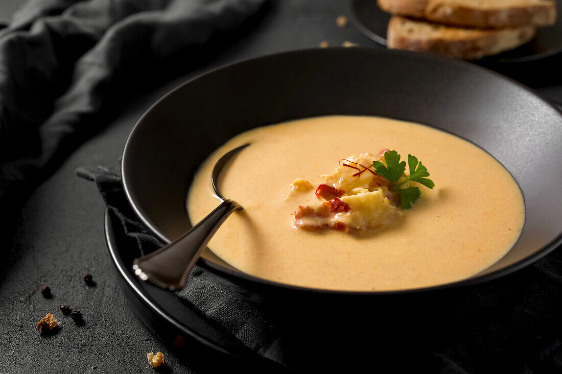 Creamy lobster soup with lobster meat and saffron threads