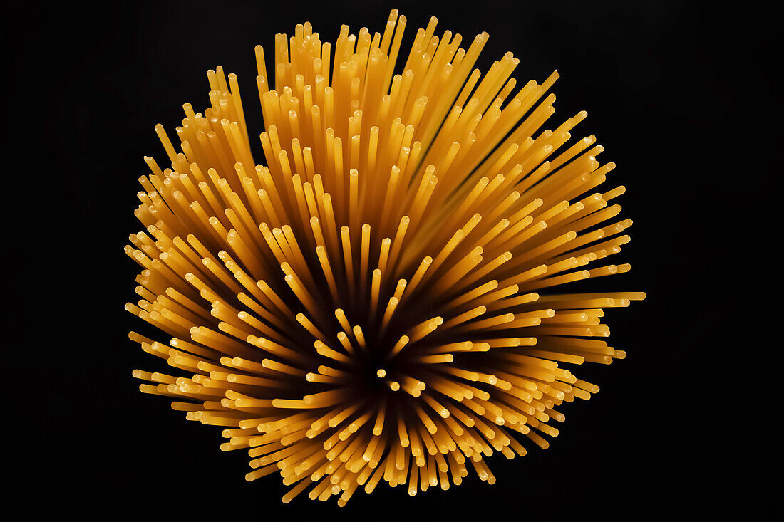 Close-up of raw spaghetti, top view