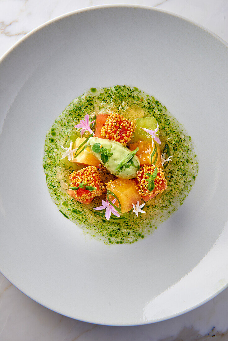 Colourful tomato salad with avocado