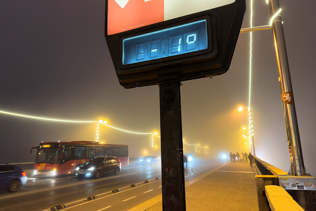 Foggy winter cityscape as temperatures go down in Zaragoza, Spain