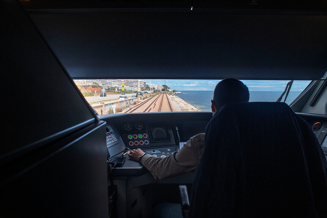 Train driver, Modernism train that runs along the Catalan coast stopping at Gaudí buildings and historic gastronomic venues: Barcelona, Martaro and Canet de Mar