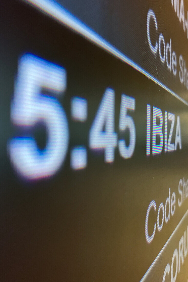 Departure information boards in Madrid Airport, Spain