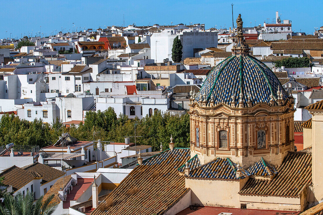 Alcázar puerta de Sevilla (Seville Gate) with San Pedro church in the background, Carmona, Andalusia, Spain. Old town Carmona Seville Andalusia South of Spain.