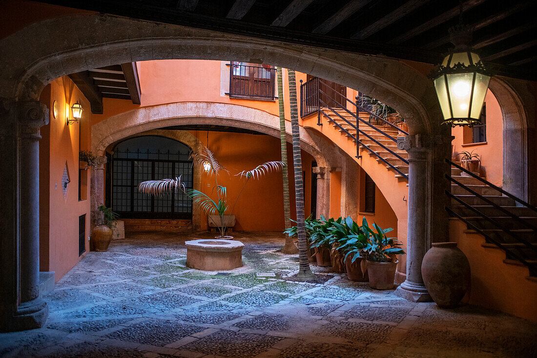 Spain Balearic islands Mallorca Palma de Mallorca Carrer de Can Savella stret Interior of some of the Majorcan patios Mallorca courtyard.