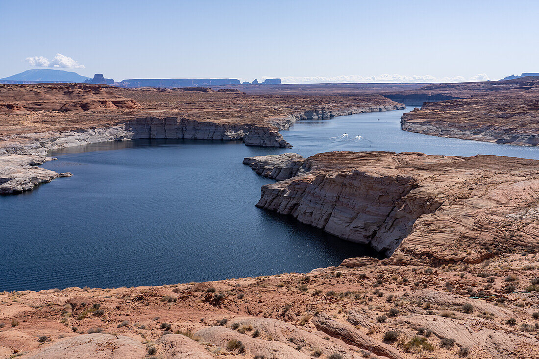 Boaters on Lake Powell near Wahweep in the Glen Canyon National Recreation Area, Arizona. Navajo Mountain is at left.