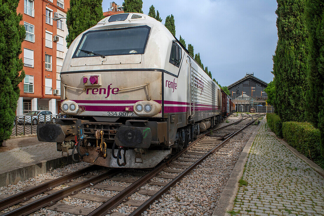 Strawberry train parked at Las Delicias train station, Madrid, Spain.