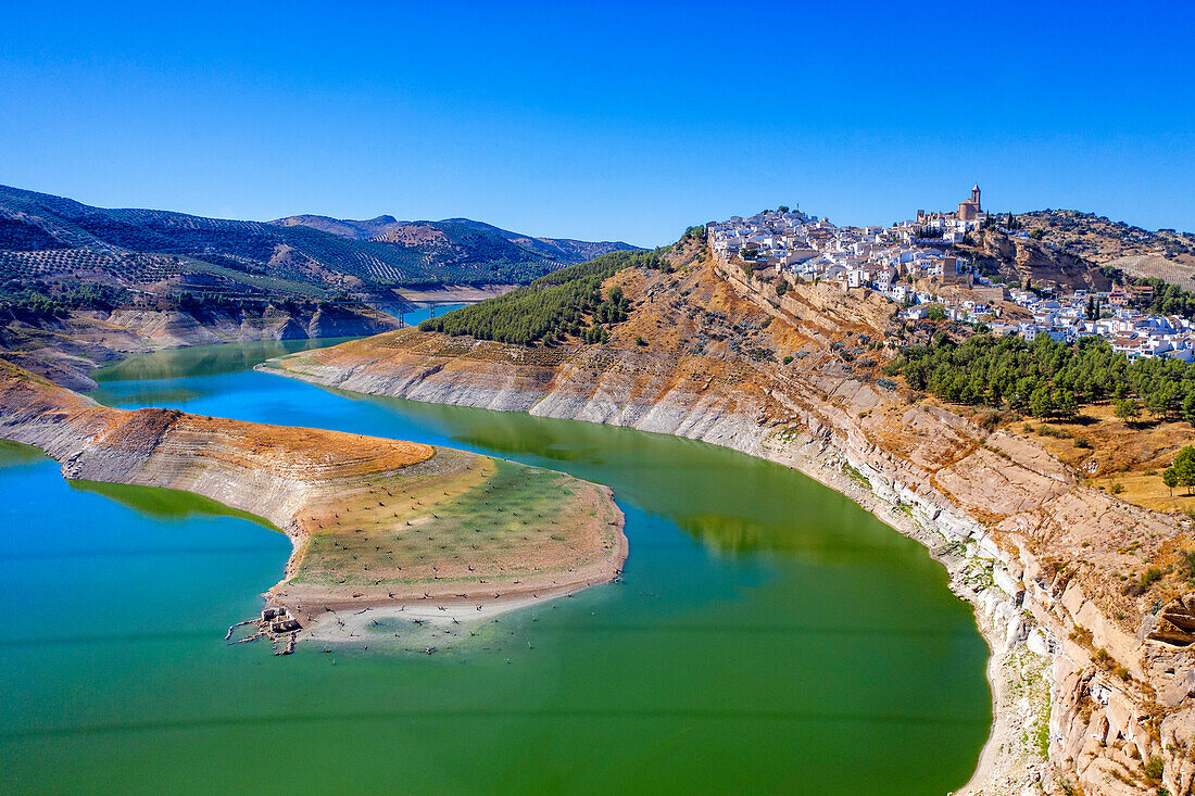 Aerial view of Iznajar village and lake reservoir in Cordoba province, Andalusia, southern Spain.