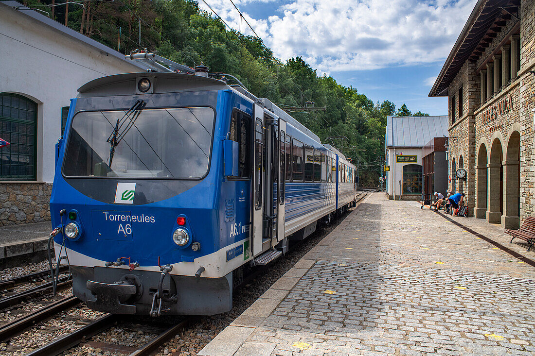 Ribes Vila station and engine of the Cogwheel railway Cremallera de Núria train in the Vall de Núria valley, Pyrenees, northern Catalonia, Spain, Europe