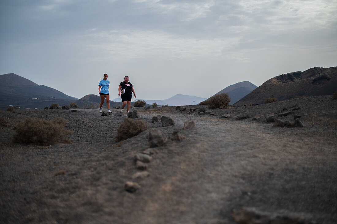 Volcan del Cuervo (Crow volcano) a crater explored by a loop trail in a barren, rock-strewn landscape