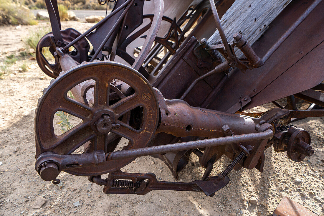 Mechanical detail of a vintage Deering New Ideal grain binding machine at Cottonwood Glen in Nine Mile Canyon, Utah.