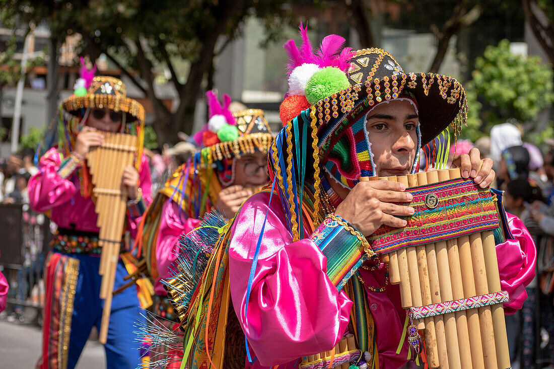 Different choreographic groups walk the path on the second day of the Blacks and Whites' Carnival. Pasto, Nariño, January 3, 2024.