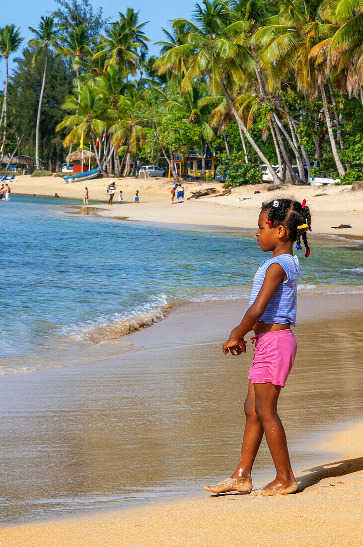 Las Terrenas beach, Samana, Dominican Republic, Carribean, America. Tropical Caribbean beach with coconut palm trees.