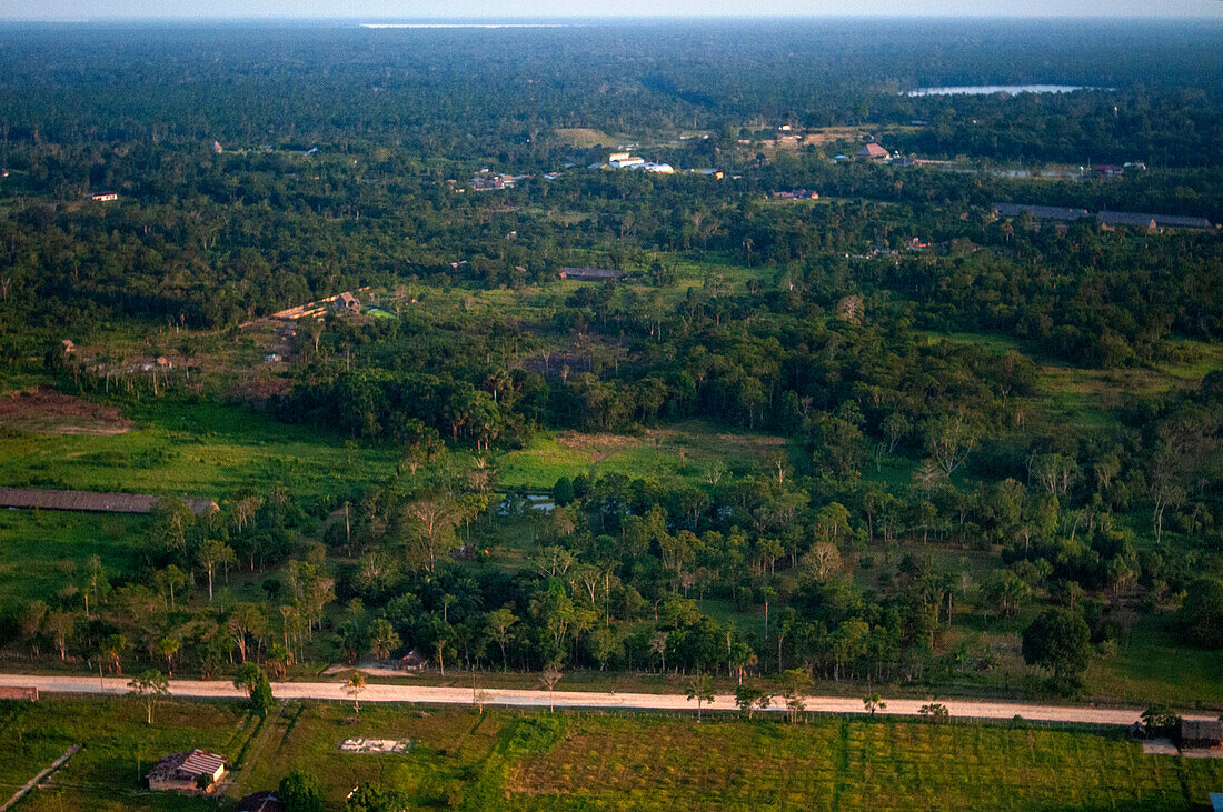 Aerial view of the Amazon Rainforest and Amazon river which comprise the countries of Brazil, Bolivia, Colombia, Ecuador, (French) Guyana, Peru, Suriname and Venezuela.