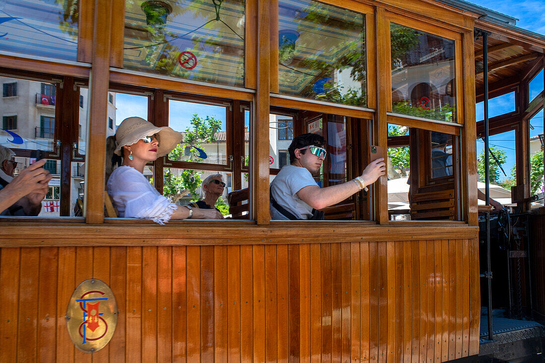 Tourists inside the vintage tram at the … – License image – 14090690   Image Professionals