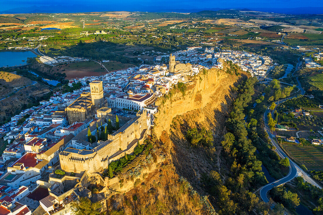 Aerial view of Ducal castle of Arcos de la Fontera, Church of San Pedro & the surounding countryside, Arcos De la Fontera, Cadiz Province, Andalusia, Spain.