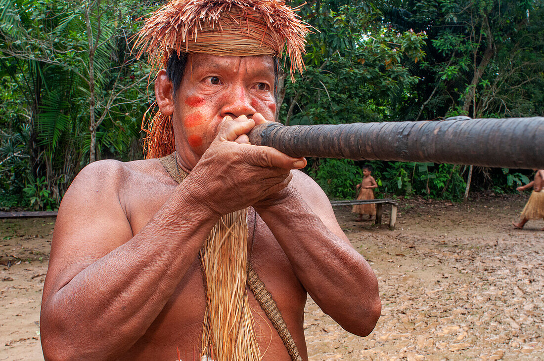 Hunting blow dart, Yagua Indians living a traditional life near the Amazonian city of Iquitos, Peru.