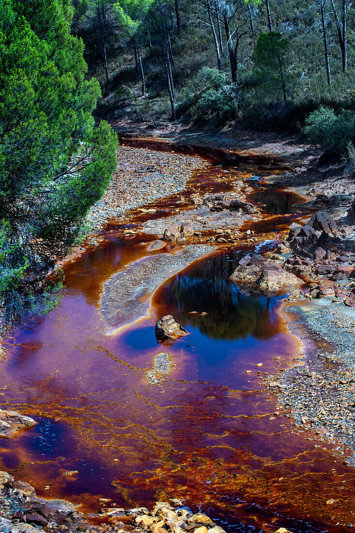 Blood red mineral laden water Rio Tinto river Minas de Riotinto mining area. The very red Rio Tinto (River Tinto), part of the Rio Tinto Mining Park (Minas de Riotinto), Huelva province, Spain.