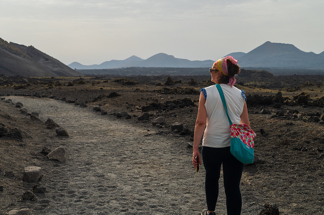 Volcan del Cuervo (Crow volcano) a crater explored by a loop trail in a barren, rock-strewn landscape