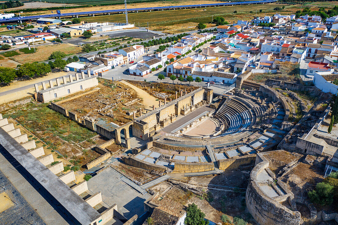 Aerial views of roman ruins of a Roman amphitheater, Italica, Seville Province, Andalusia, Spain.