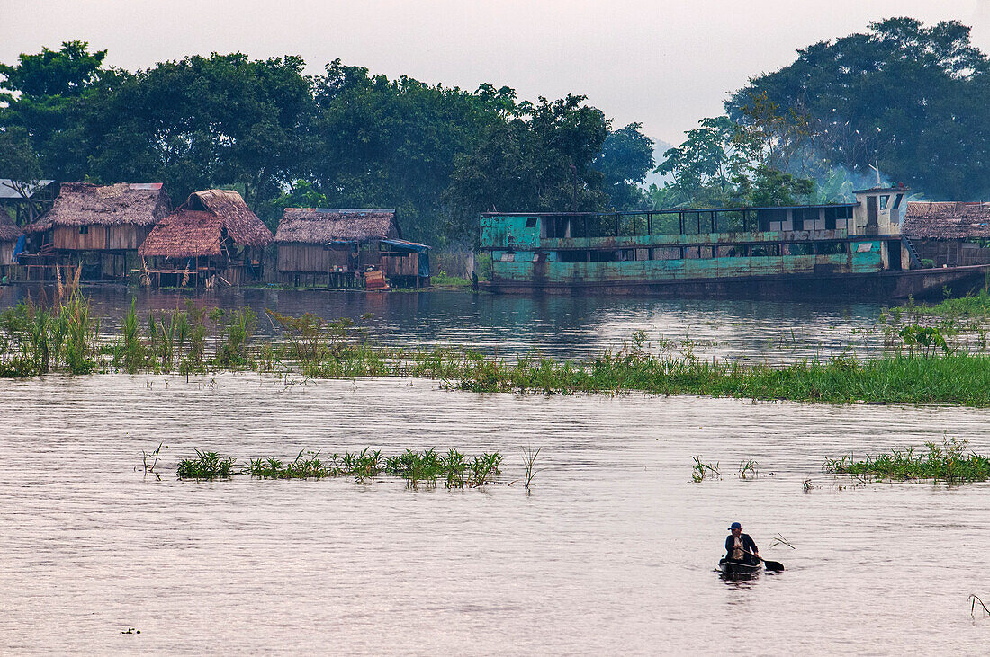 Floating houses in the Amazon River, Iquitos, Loreto, Peru, South America.