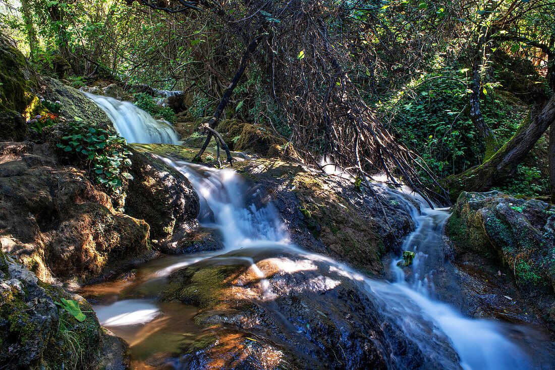 Cascades of Hueznar waterfalls in San Nicolas del Puerto, Seville. Andalusia, Spain.