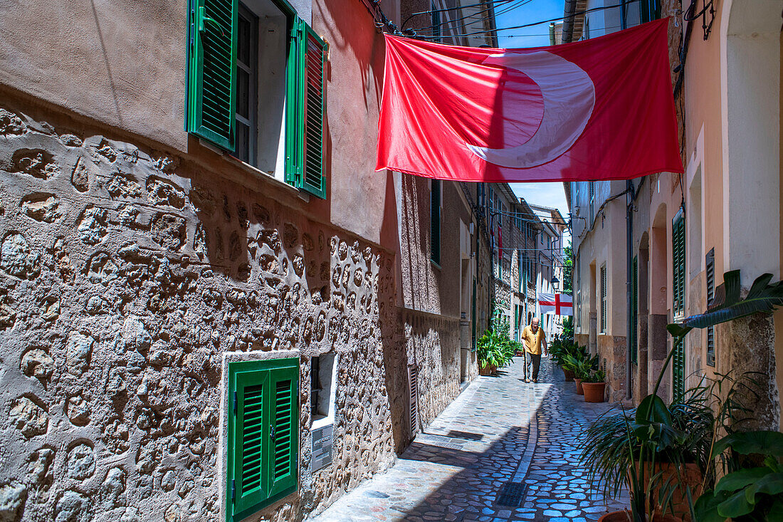 Moors and Christians flags in the interior streets of the center of Soller, Soller Majorca, Balearic Islands, Spain, Mediterranean, Europe.